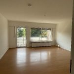 Wohnzimmer mit Balkon