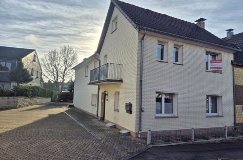 Vorne wohnen, hinten bauen