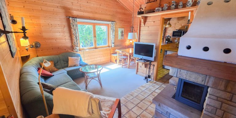 Wohnzimmer mit Kaminofen EG