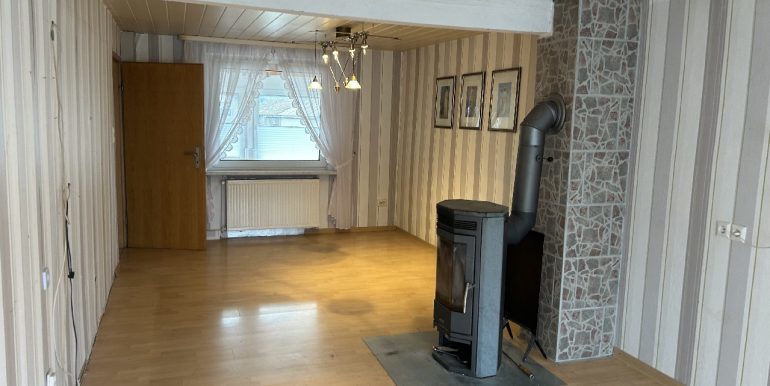 Wohnzimmer mit Kamin