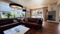 Wohnzimmer mit Terrassenaustritt