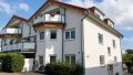Hausansicht mit KI bearbeitet